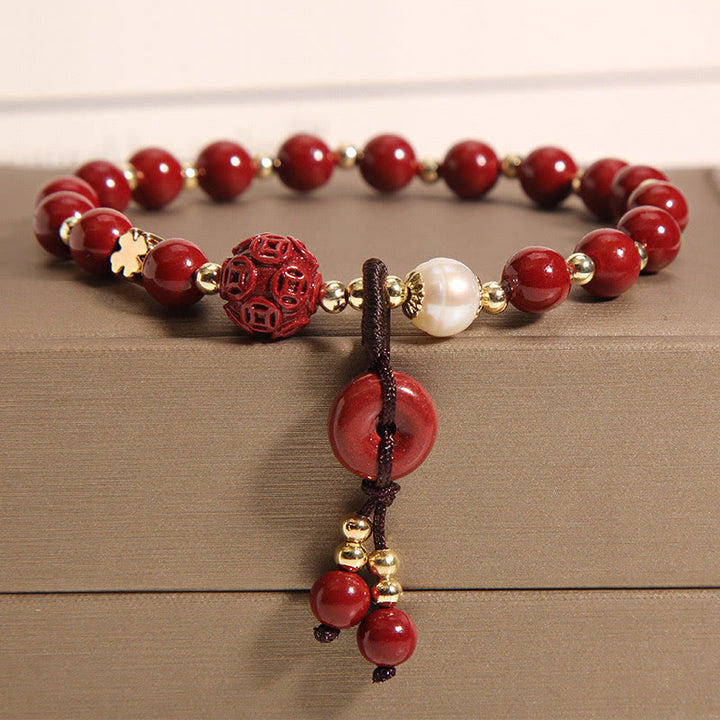 Bracelet de bénédiction avec breloque en cuivre et boucle de paix en cinabre naturel Buddha Stones