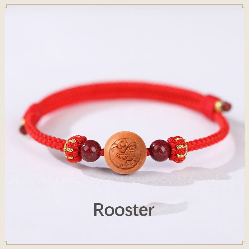 Bracelet de richesse en bois de pêche naturel Buddha Stones et caractère Fu du zodiaque chinois sculpté en cinabre