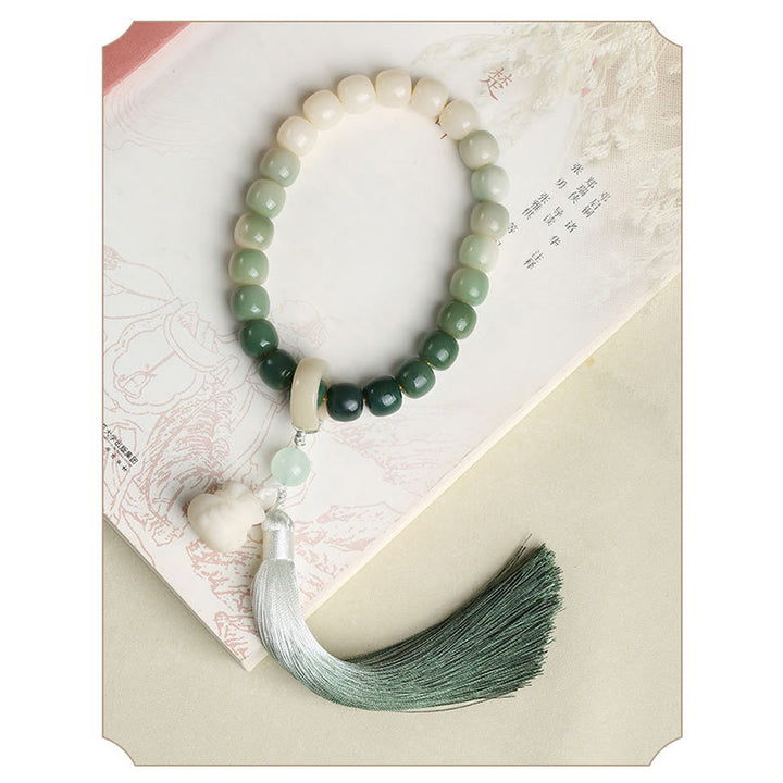 Buddha Stones Dégradé Naturel Graine de Bodhi Fortune Sac d'Argent Sagesse de Lotus Gland Poignet Mala