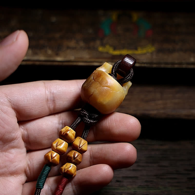Collier pendentif en os de chameau tibétain Buddha Stones et crâne du Seigneur des cadavres