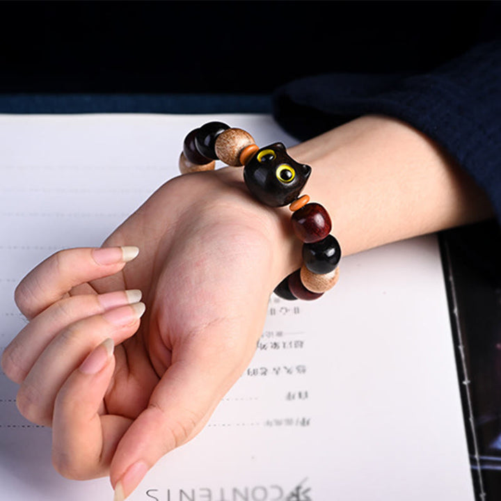 Bracelet de protection gravé en bois de santal rouge et ébène avec petites feuilles de Buddha Stones et chat mignon - image 7