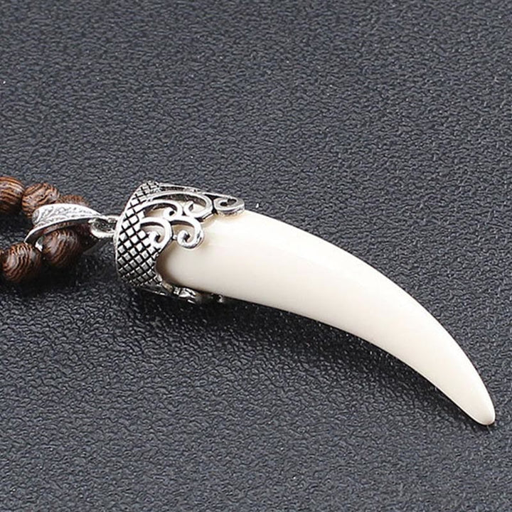 Collier pendentif de méditation en bois de wengé et pierre turquoise de style corne