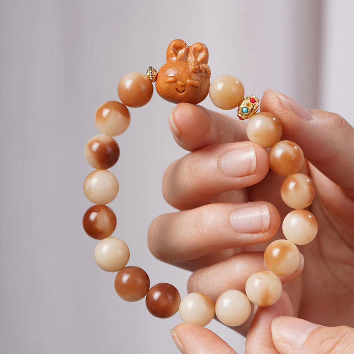 Bracelet de paix en forme de lapin avec de jolies graines de Bodhi naturelles et des Buddha Stones