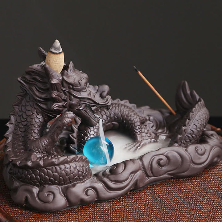 Brûleur d'encens de protection de fleur de dragon jouant à la balle