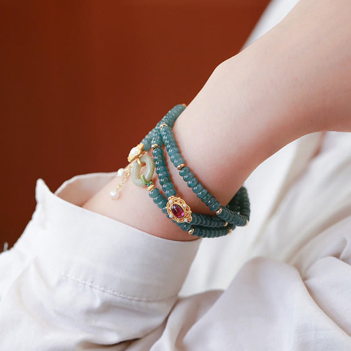 Bracelet triple tour en argent sterling 925 plaqué or avec fleur de jade cyan et boucle de paix Buddha Stones