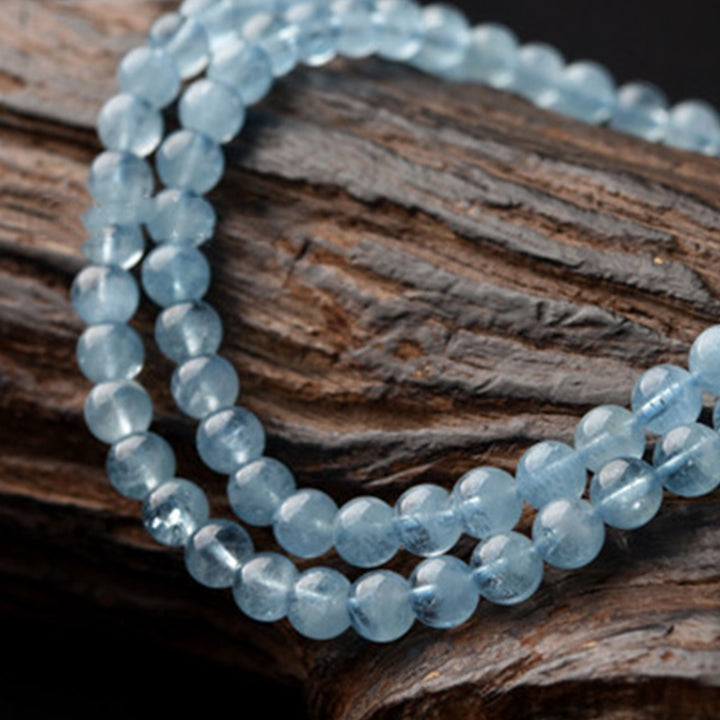 Bracelet de guérison de la paix en aigue-marine naturelle de Buddha Stones