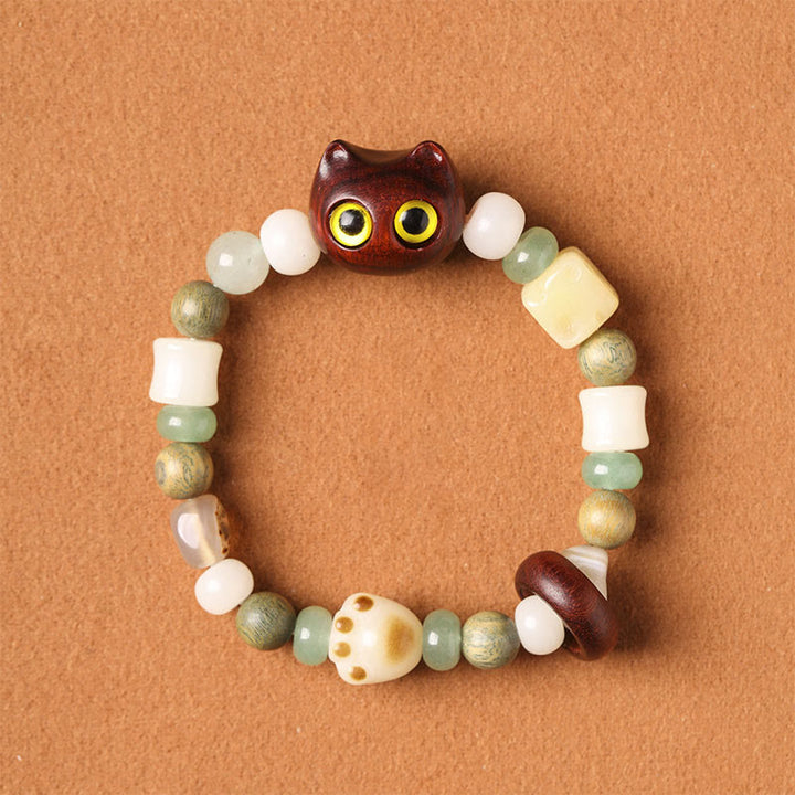 Buddha Stones Graine de Bodhi Bois de santal vert Bois d'ébène Petite feuille Bois de santal rouge Tête de chat Patte Griffe Bracelet de paix - Chat en bois de santal rouge à petites feuilles (yeux jaunes) (circonférence du poignet 14-16 cm) - image 8