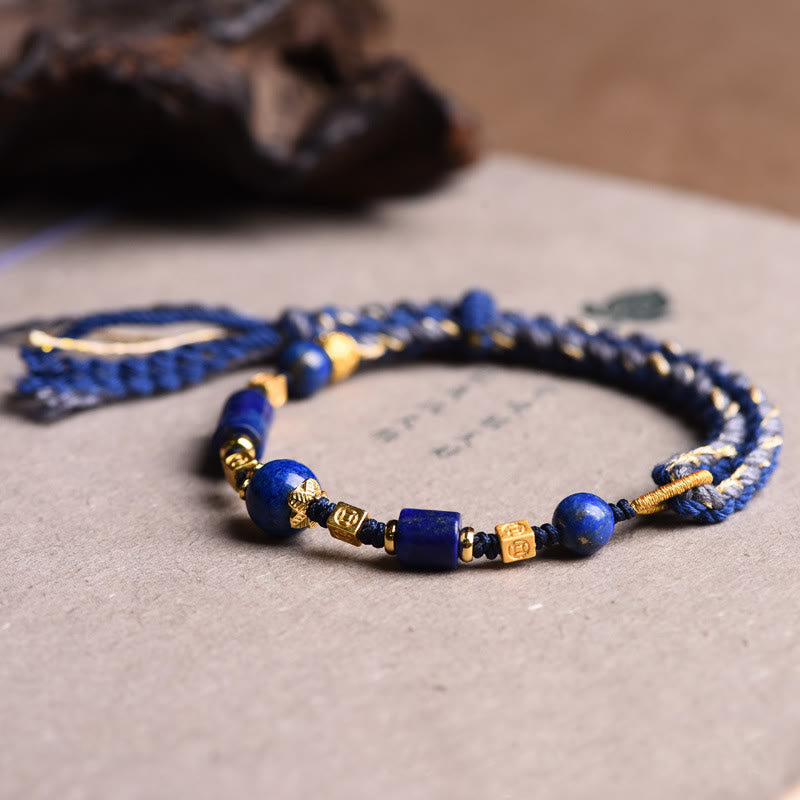 Bracelet en corde positive en perles de lazurite naturelles faites à la main avec des Buddha Stones