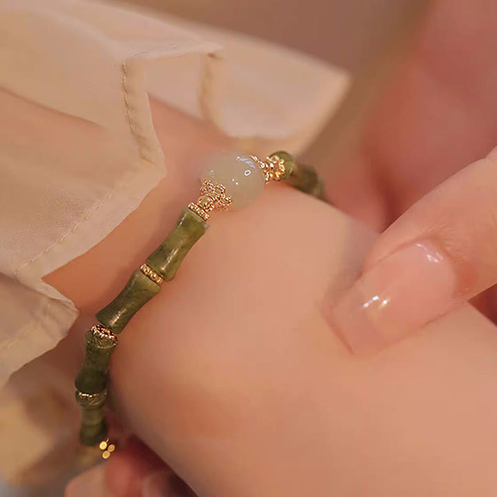 Bracelet porte-bonheur en jade Hetian péridot plaqué cuivre 14 carats avec Buddha Stones et motif bambou