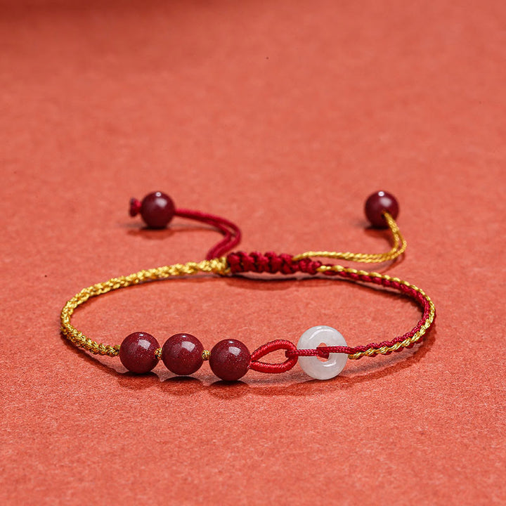 Bracelet de bénédiction avec boucle de paix en jade cinabre naturel de Buddha Stones