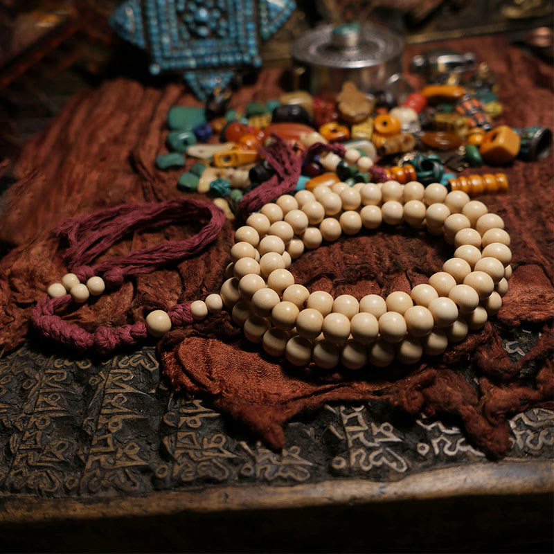 Mala en bois d'Abelia Biflora avec 108 Buddha Stones pour éloigner les mauvais esprits