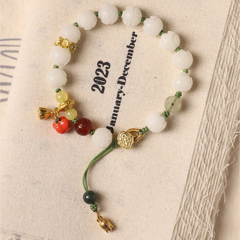 Bracelet d'harmonie et de paix en perles de citrouille et de lotus en Buddha Stones naturelles