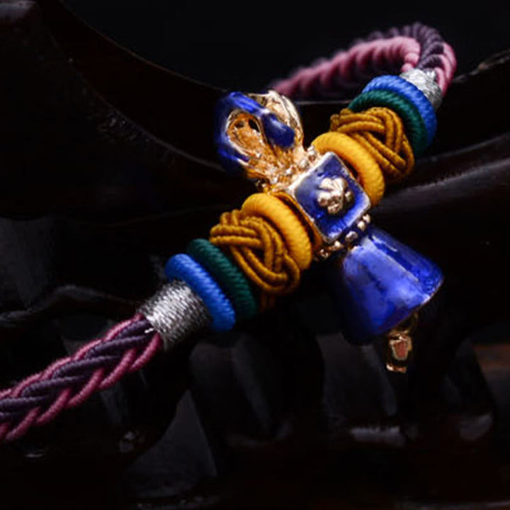 Bracelet tibétain fait main en corde Dorje Vajra à huit fils