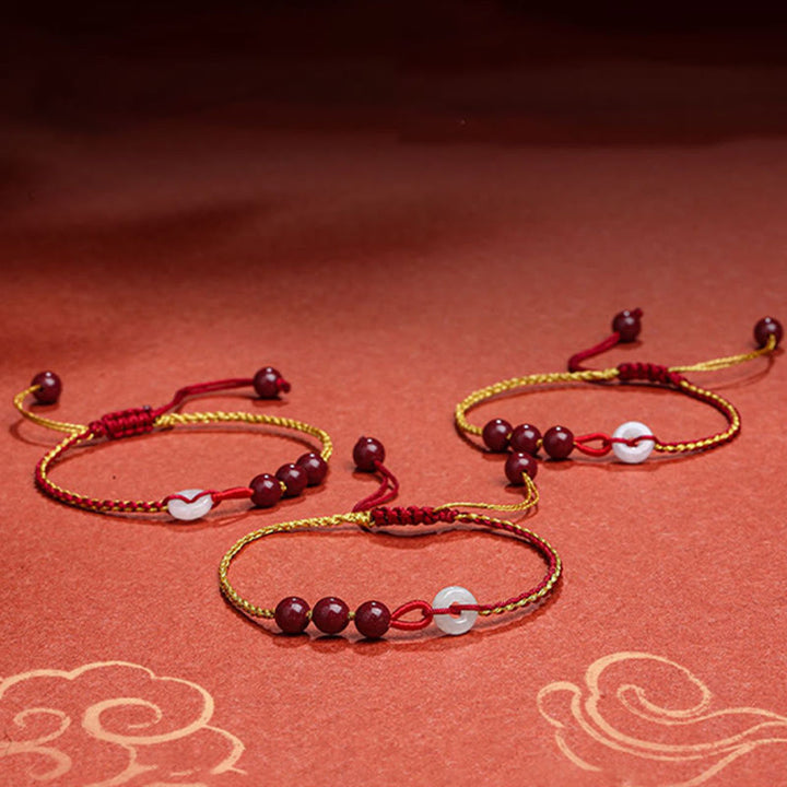 Bracelet de bénédiction avec boucle de paix en jade cinabre naturel de Buddha Stones
