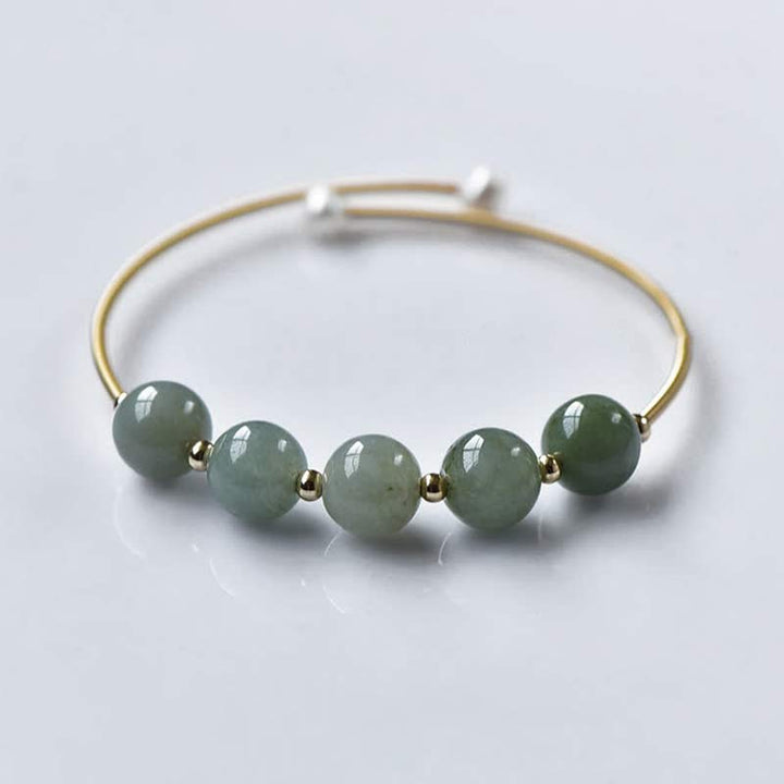Bracelet jonc en jade avec Buddha Stones et bénédictions pour la chance et l'abondance