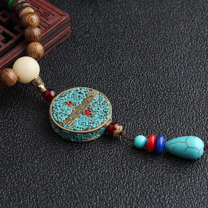 Collier de méditation en bois de wengé Buddha Stones en turquoise et perles Dzi