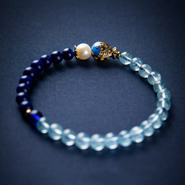 Bracelet de guérison en Buddha Stones, aigue-marine naturelle, lapis-lazuli et poisson - image 0