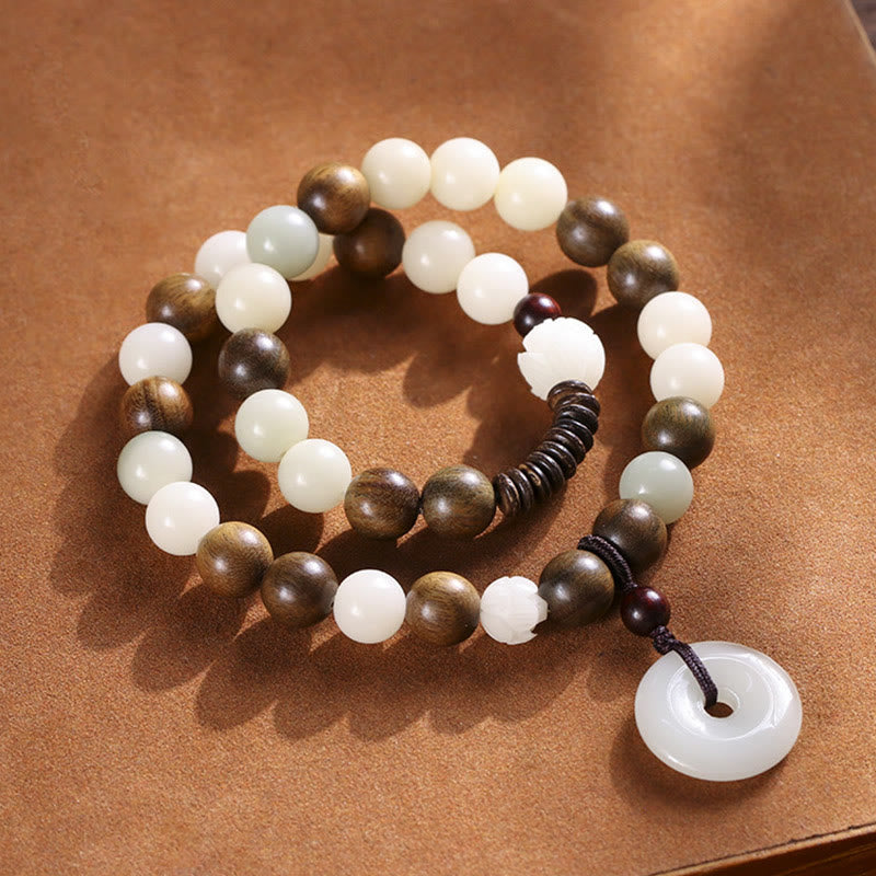 Bracelet double tour en harmonie avec boucle de paix en bois de santal vert et graines de Bodhi et Buddha Stones