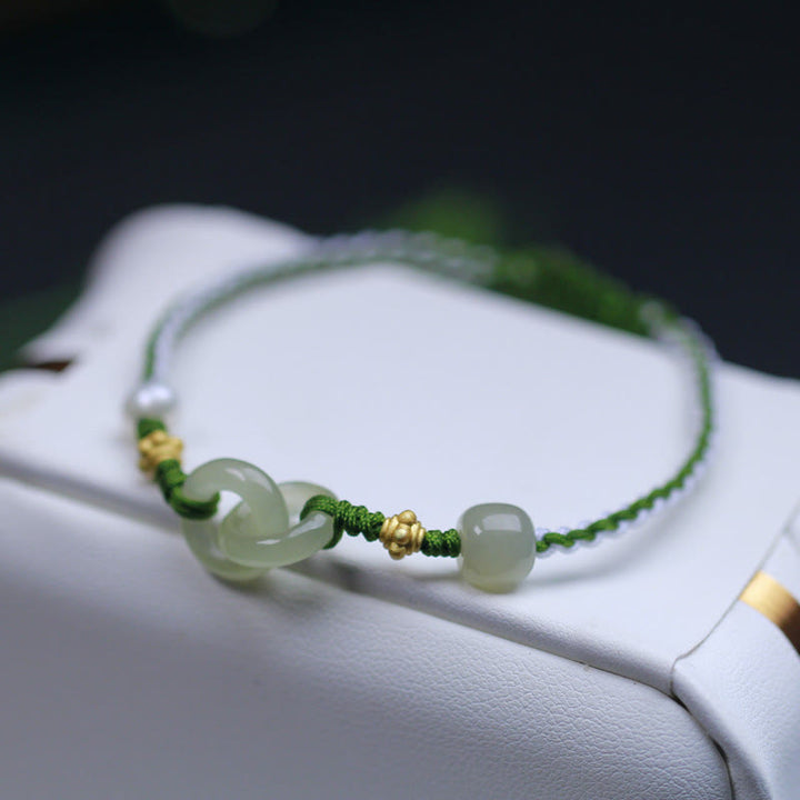 Bracelet tressé porte-bonheur en argent sterling 925 avec double boucle de paix et jade Hetian de Buddha Stones