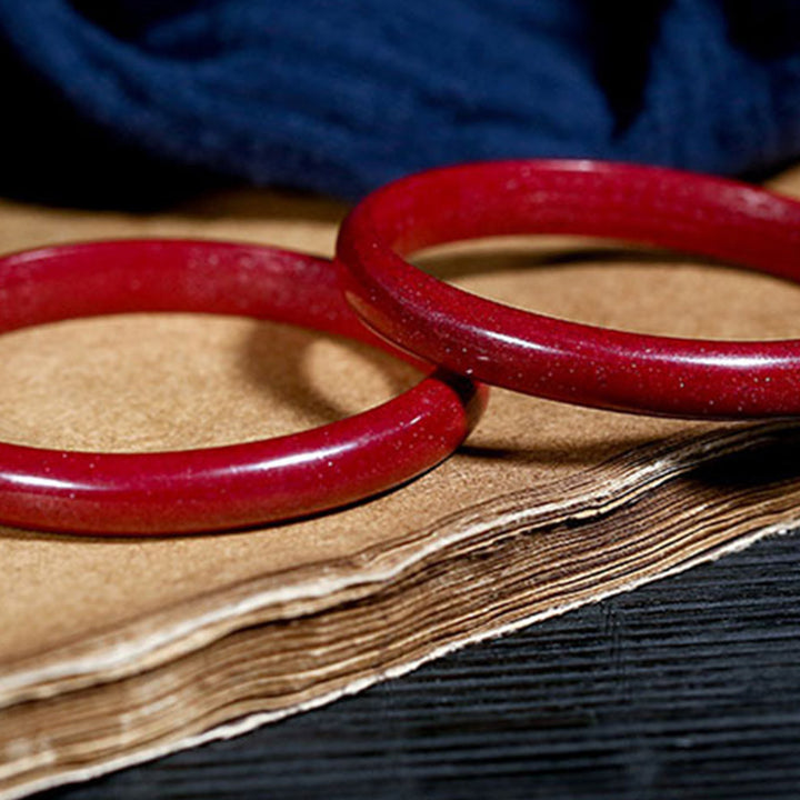 Bracelet jonc de bénédiction gravé du Sutra du cœur en Buddha Stones en cinabre