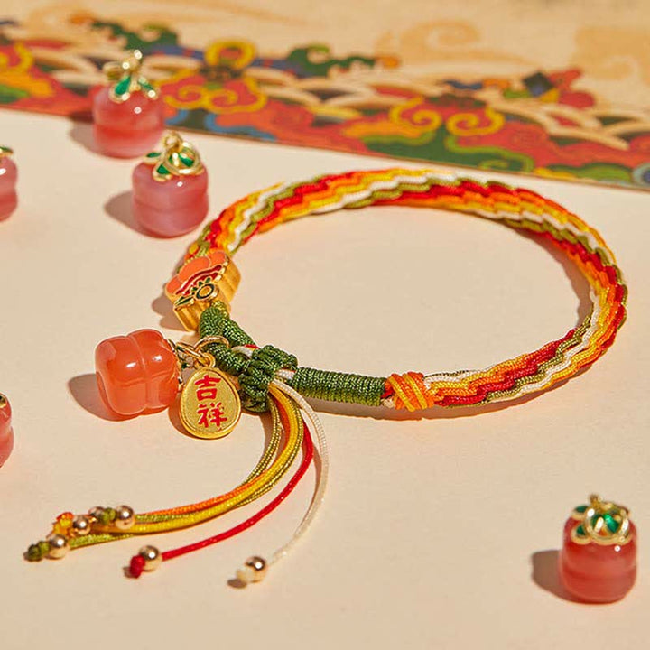 Bracelet tressé en corde avec nœud de force et de réincarnation en agate rouge et Buddha Stones