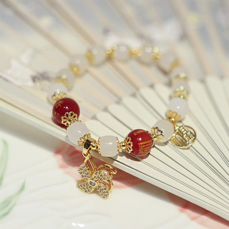 Bracelet de bénédiction avec breloque en forme de moulin à vent en Buddha Stones et caractère Fu