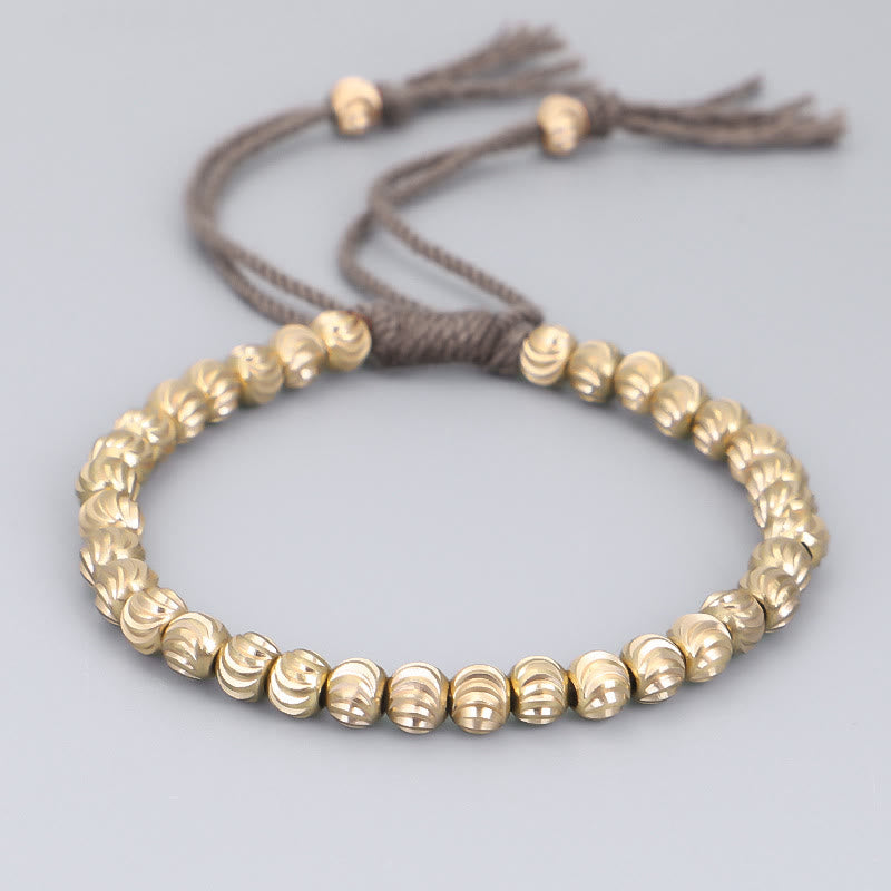 Bracelet porte-bonheur en perles de cuivre tibétaines faites à la main avec Buddha Stones