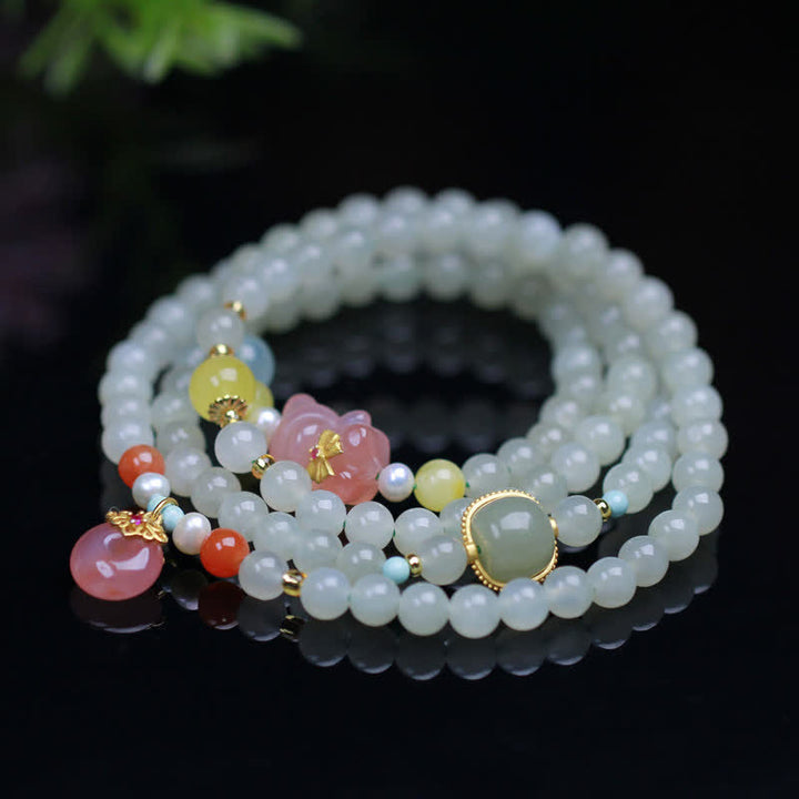 Bracelet en Buddha Stones en jade Hetian naturel avec cristal rose et boucle de paix pour le bonheur et l'abondance