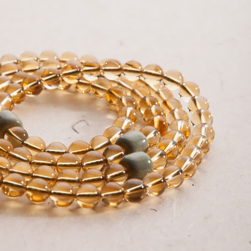 Bracelet Mala 108 Buddha Stones, citrine, bois de santal, turquoise, protection et prospérité