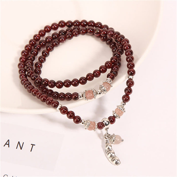 Bracelet triple tour de protection PiXiu en Buddha Stones, grenat naturel, quartz fraise et haricots verts