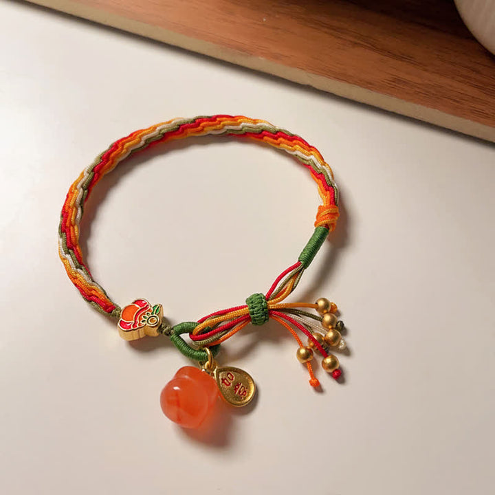 Bracelet tressé en corde avec nœud de force et de réincarnation en agate rouge et Buddha Stones