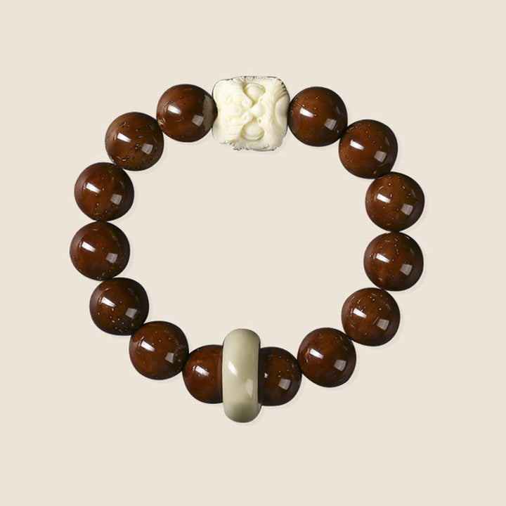 Bracelet de sagesse du lion dansant en Buddha Stones et graines de Bodhi violettes