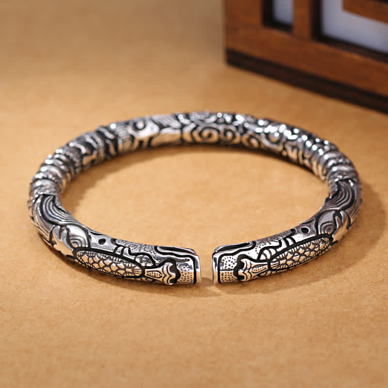 Bracelet porte-bonheur sculpté en forme de tête de dragon
