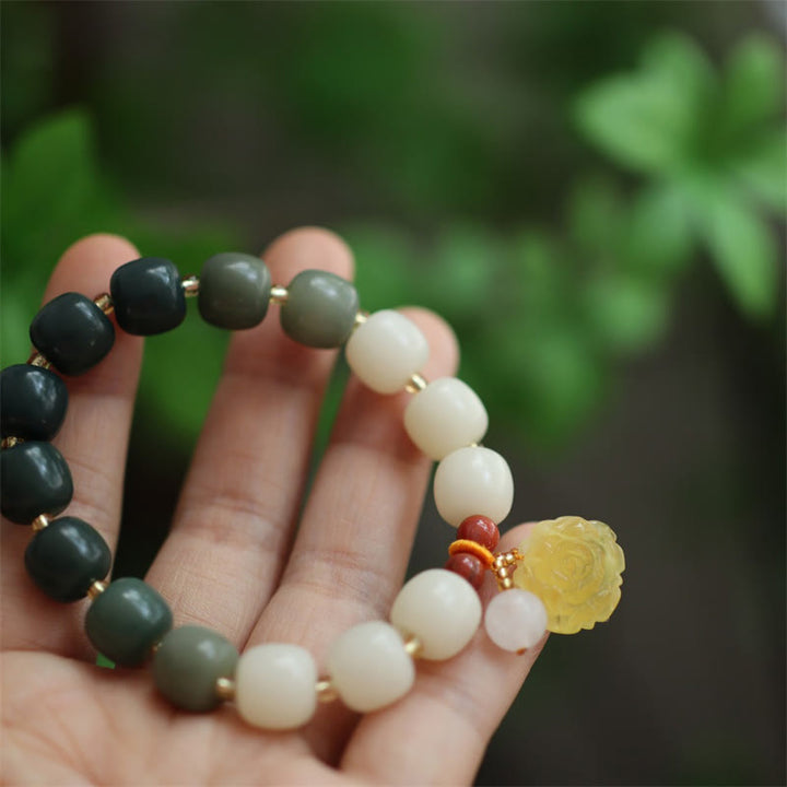 Bracelet de paix en ambre et graines de Bodhi avec Buddha Stones dégradées
