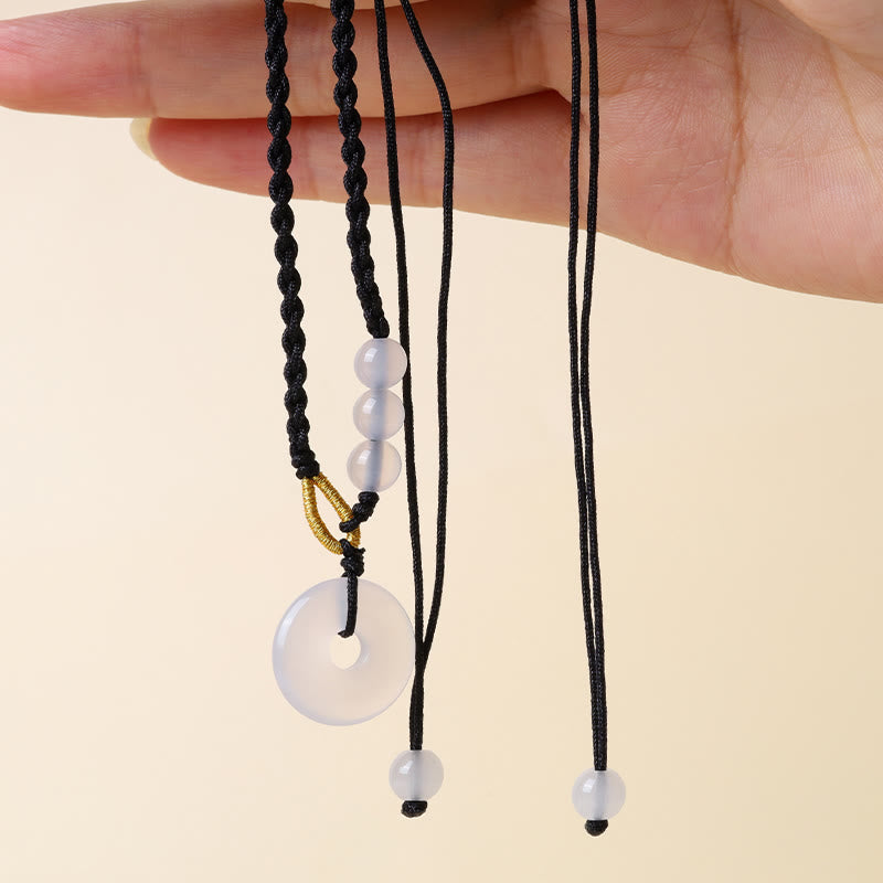 Collier pendentif de guérison avec boucle de paix en quartz fraise et calcédoine de Buddha Stones