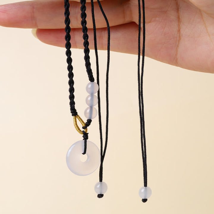 Collier pendentif de guérison avec boucle de paix en quartz fraise et calcédoine de Buddha Stones