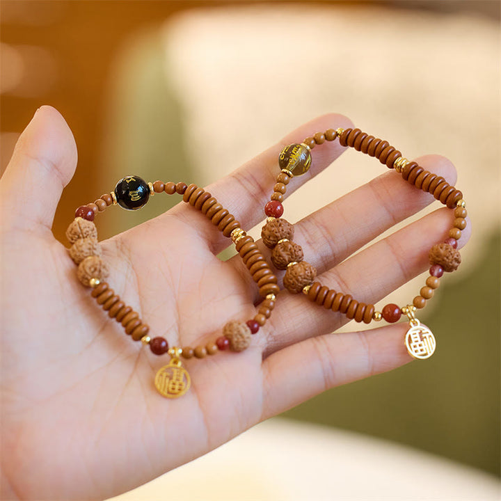 Bracelet de richesse en Buddha Stones tibétaines Bodhi Seed Onyx noir Quartz fumé Om Mani Padme Hum Fu