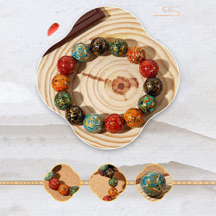 Bracelet calme en perles de laque multicolores naturelles Buddha Stones