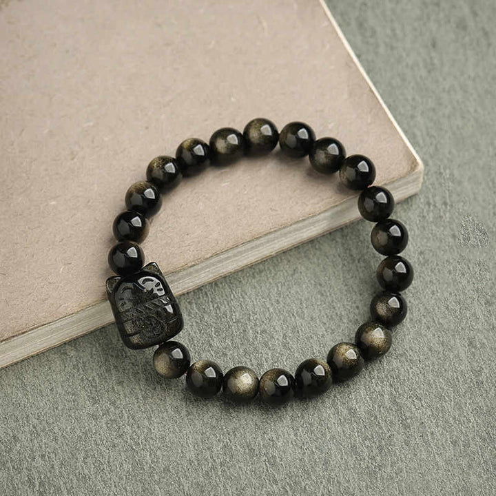 Bracelet de protection porte-bonheur en obsidienne dorée et argentée avec Buddha Stones et jolie patte de chat porte-bonheur - Obsidienne à reflets dorés - Chat porte-bonheur - 8 mm - image 19