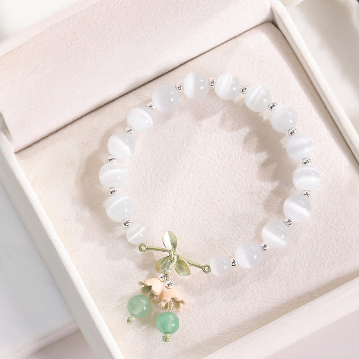 Bracelet à breloques Buddha Stones de chat en aventurine verte et calcédoine bleue en cristal rose et orchidée de la paix - Œil de chat et aventurine verte - image 0