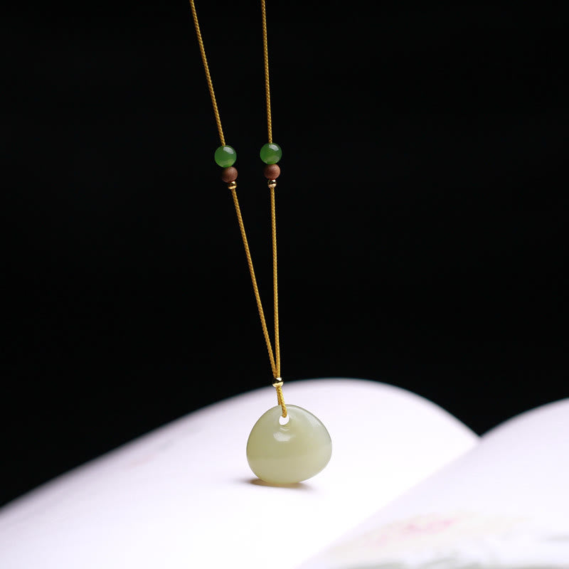 Collier pendentif en jade naturel Hetian à motif de petit sac pour la prospérité