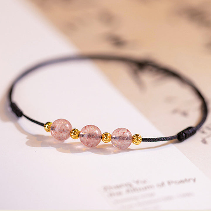 Bracelet de cheville en fil rouge avec perles en cristal de fraise et Buddha Stones