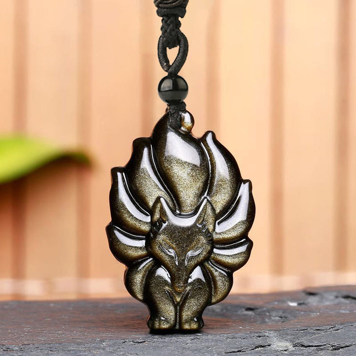 Collier de protection avec pendentif en Buddha Stones dorés