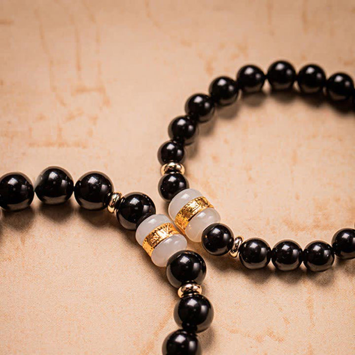 Bracelet magnétique pour couple en obsidienne Buddha Stones et jade Om Mani Padme Hum