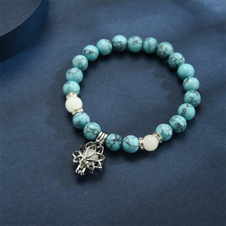 Bracelet de protection Lotus en perles lumineuses en turquoise tibétaine Buddha Stones