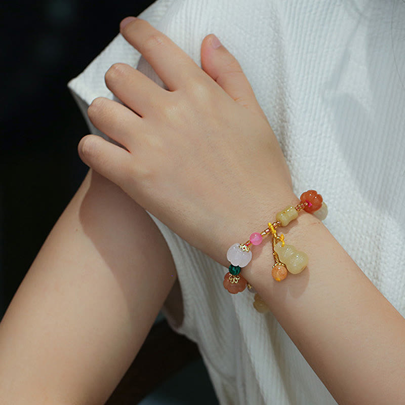 Bracelet à breloques en perles de citrouille Pixiu en soie dorée naturelle et cristaux de jade