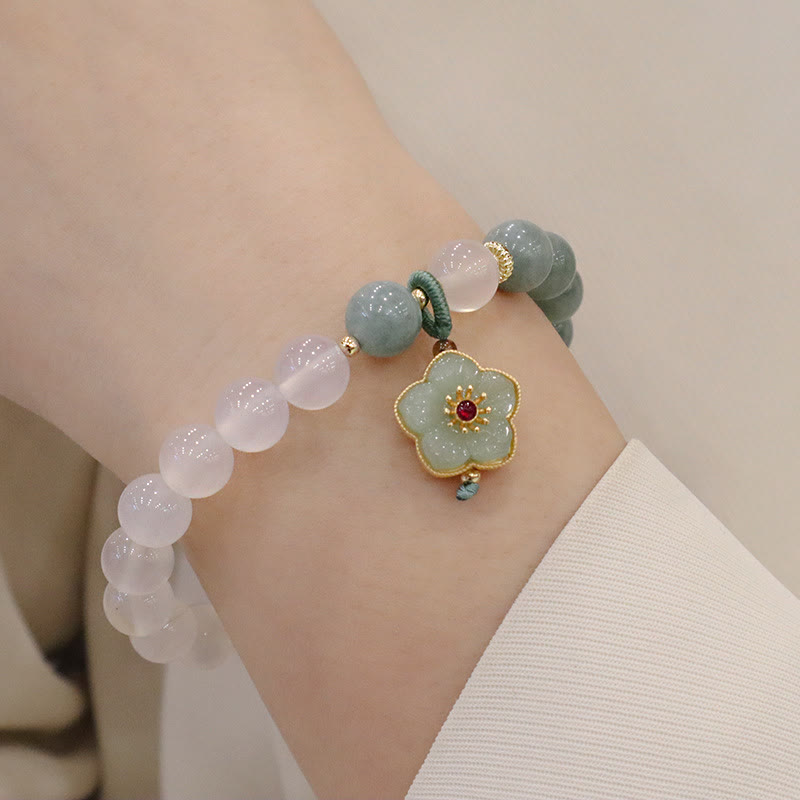 Bracelet de protection avec boucle de paix en Buddha Stones et jade blanc et fleur de lotus