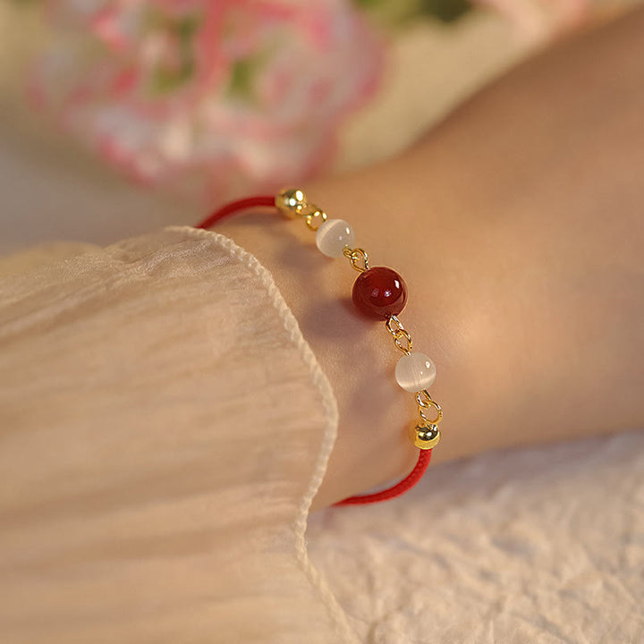 Bracelet de confiance tressé en agate rouge œil de chat avec Buddha Stones - Agate rouge et fil rouge (taille du bracelet 15 + 5 cm) - image 1