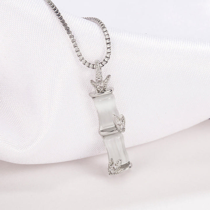 Collier pendentif harmonieux en calcédoine et bambou avec Buddha Stones
