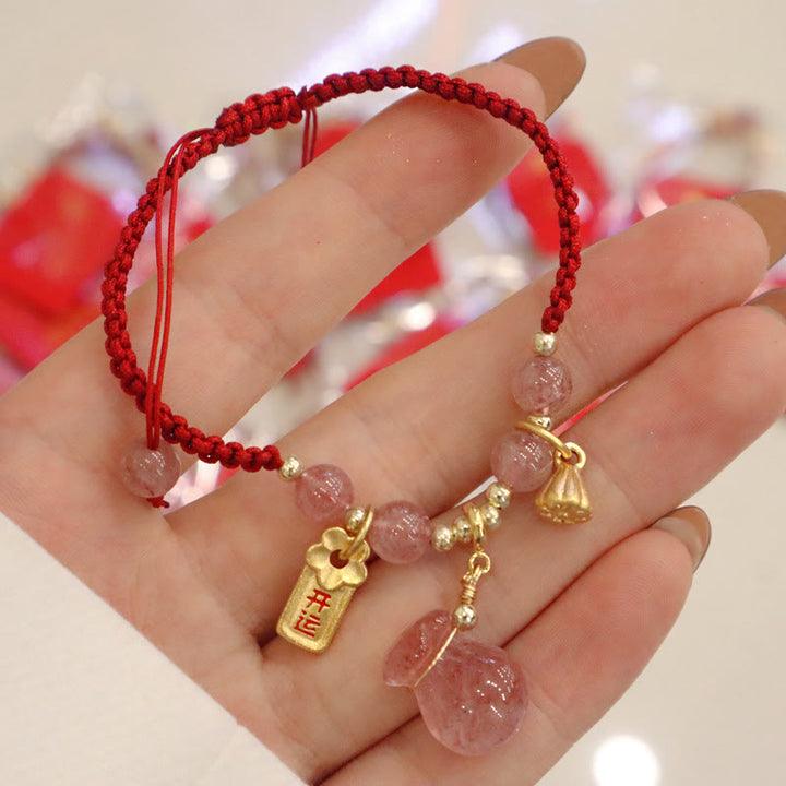 Bracelet tressé en fil rouge avec breloque de guérison en quartz fraise naturel et Buddha Stones